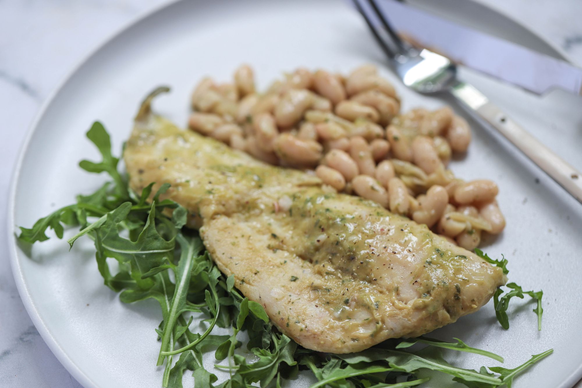 Baked White Fish with Beans in Parsley Sauce